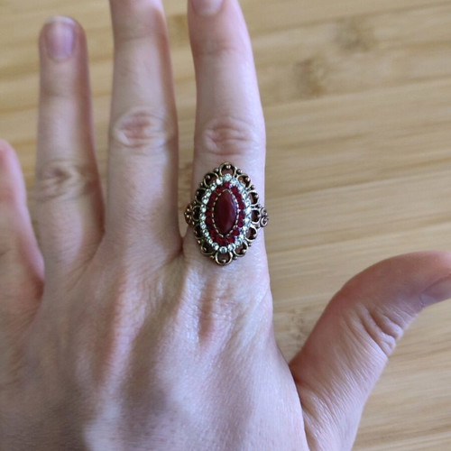 Vintage ring with red stone used