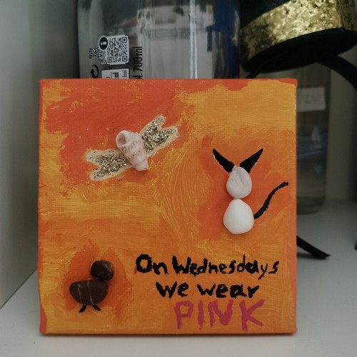 Handmade painting with natural stones and shells on small canvas