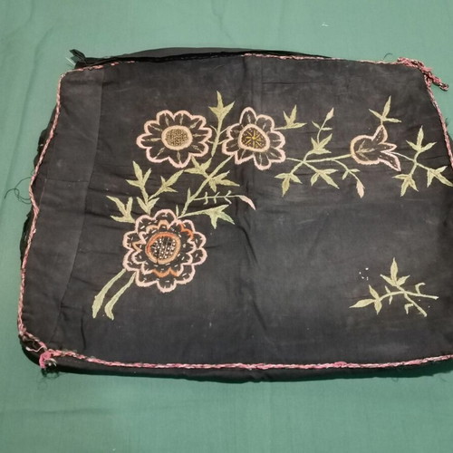Embroidered pillow used with 1920s floral design