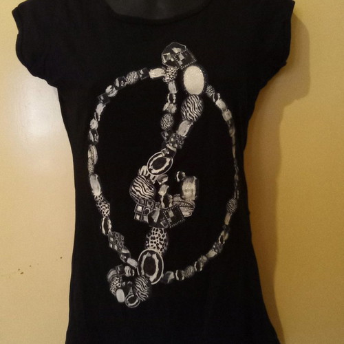 Black t-shirt with treble clef print used, size M