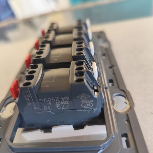 Legrand outdoor wall case with 4 relay toggle switches like new