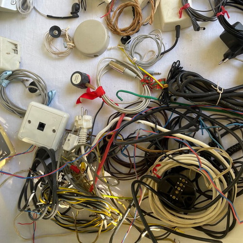 Set of old cables, sockets and telephony devices used