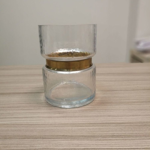 Decorative glass candle holder vase used with gold design
