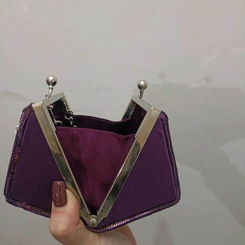 Clutch bag polygonal like new with purple sequins