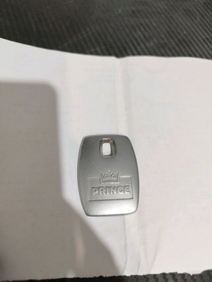 Prince collectible keychain like new, metal 5x3.5 cm