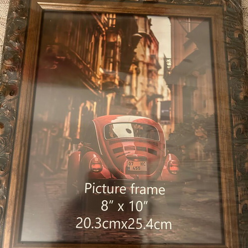 Ornate wooden frame, 20.3cmX25.4cm. Unused, can be hung or displayed.