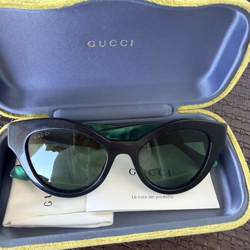 Gucci sunglasses used, black and green