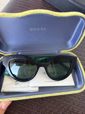 Gucci sunglasses used, black and green