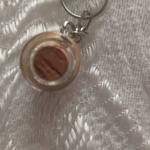 Keychain in glass jar with colorful beads like new