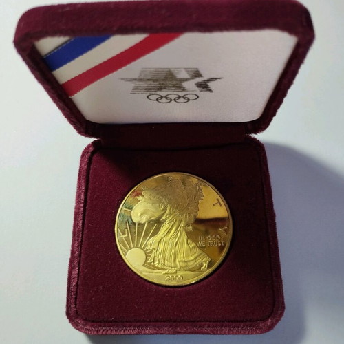 Liberty Eagle gold-plated medal in velvet case like new