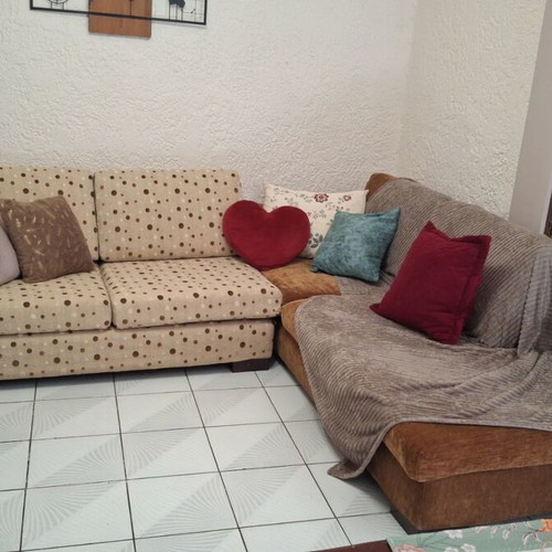Corner sofa with two-seater and recliner