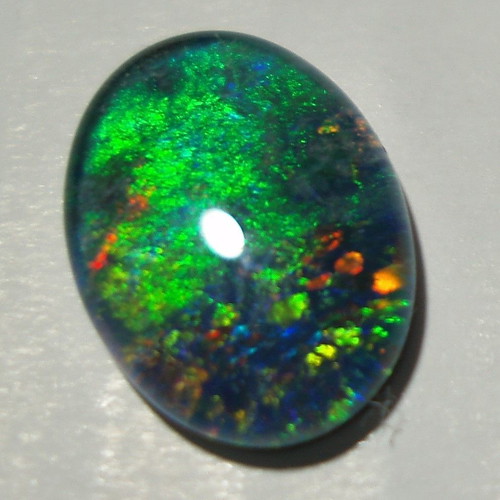 Australlian Opal Doublet 3.340 ct new, size 14x10 mm