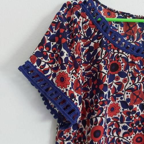 Blouse used, size S, thin fabric with blue trim on sleeves and neck