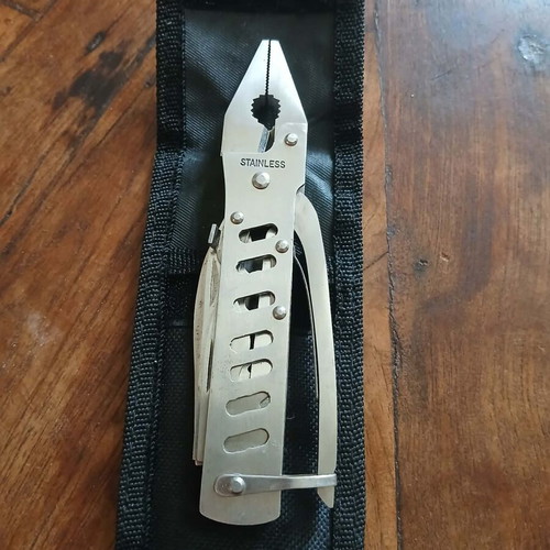Folding stainless steel multitool new with case