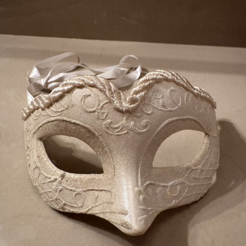 Two ornate masks like new, one gray and one white