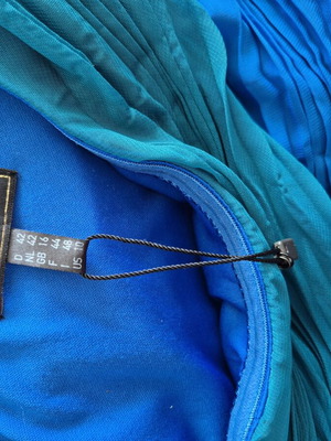 Official dresses in blue-green and black-gold XL, others S
