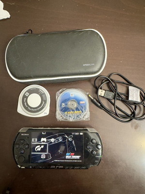 PlayStation Portable PSP-3000 with 3 games, case and accessories