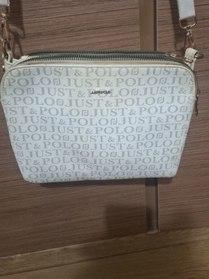Crossbody bag used with compartments
