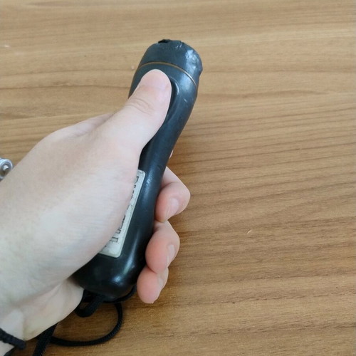 Duracell flashlight used with wear on front part
