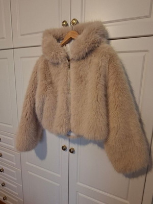 Beige fur jacket with hood, oversized fit