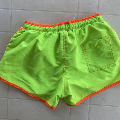 Men's swim shorts like new, fluorescent green with orange details