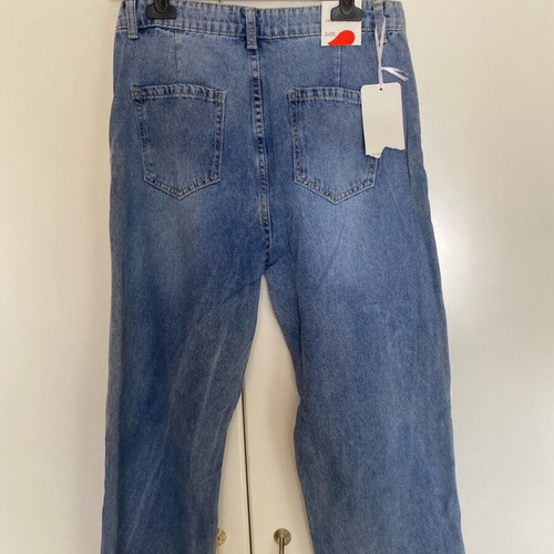 Denim jeans new with adjustable elastic, sizes S and M