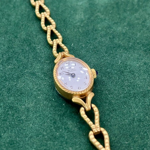 Vintage MIDAS watch like new, mechanical, white and gold