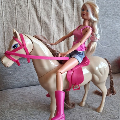 Barbie doll with horse