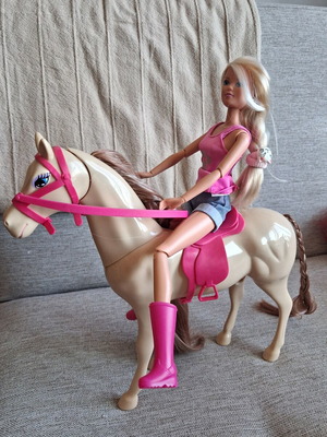 Barbie doll with horse