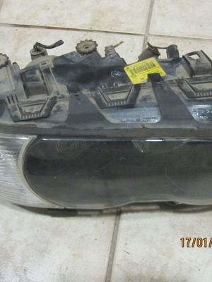 Front right headlight BMW E46 '01-'03 used with black background