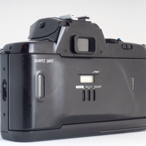 Nikon F-401X 35mm film camera with original leather strap