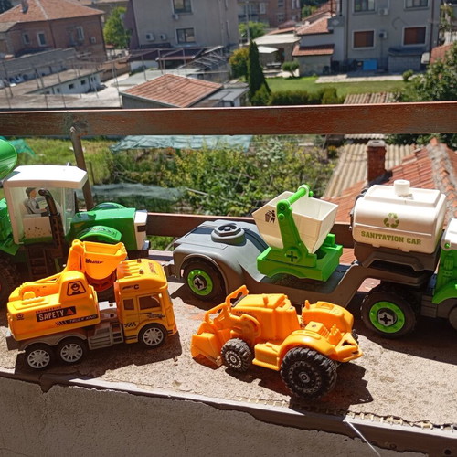 Children's construction and specialized toy trucks set of 4 used