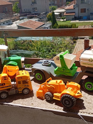 Children's construction and specialized toy trucks set of 4 used