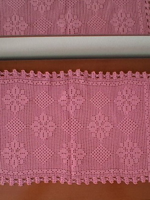 Four-piece placemat set in a vibrant pink shade.