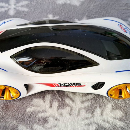 Racing car new with motion, music and lights