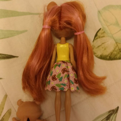Doll with her pet like new