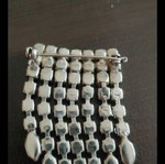 Antique brooch used with colorful stones