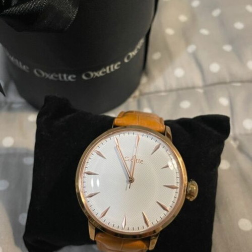Oxette wristwatch used, brown leather strap, gold details