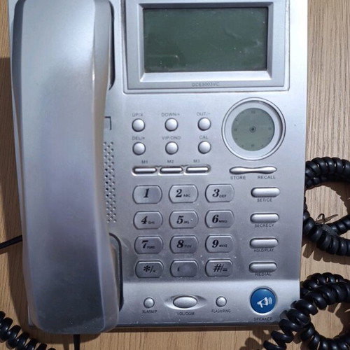 Landline phone used, gray, wired, working