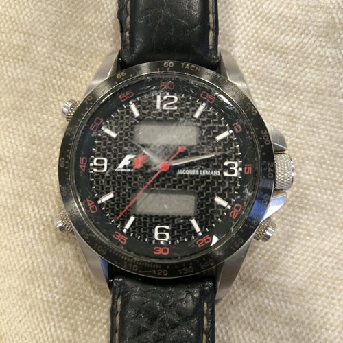 Jacques Lemans F5009 watch used with worn glass and strap