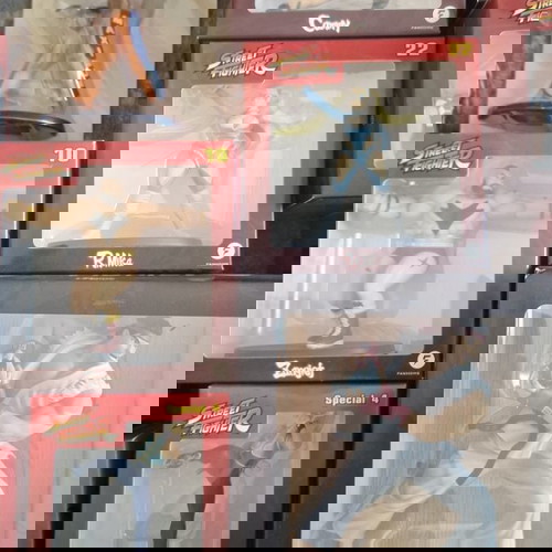 Street Fighter collection with 22 sealed figures and magazines, new