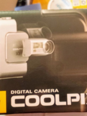 Nikon Coolpix collectible packaging used with instructions and CD ROM