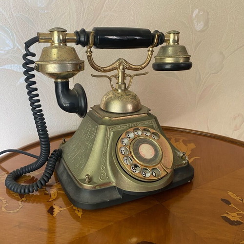Vintage telephone device used, decorative antique