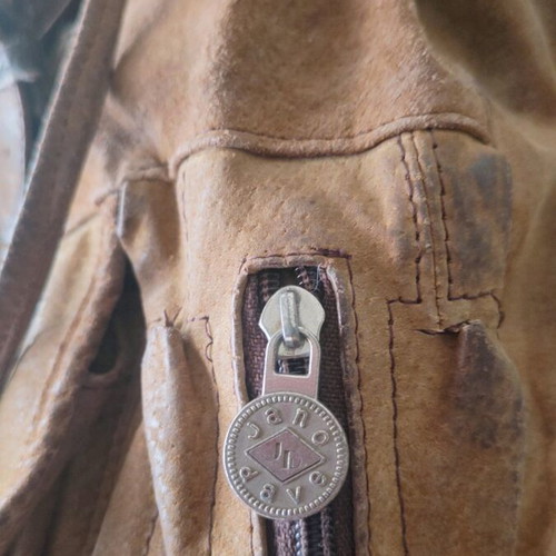 Handmade leather backpack used with adjustable straps
