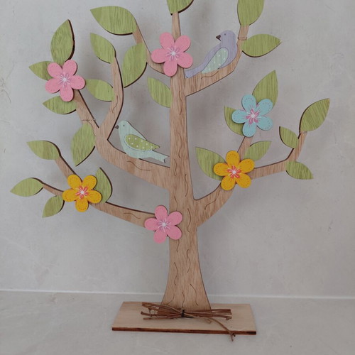 Wooden decorative tree refurbished with colorful birds and flowers