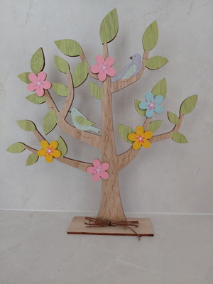 Wooden decorative tree refurbished with colorful birds and flowers