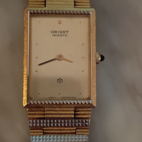 Orient quartz women's watch like new, gold and silver