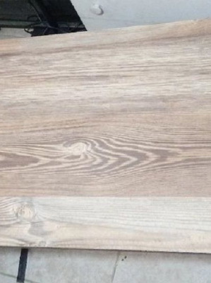 Metal table with MDF surface.