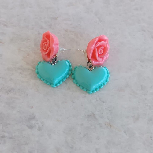 Plastic handmade earrings like new with box now
