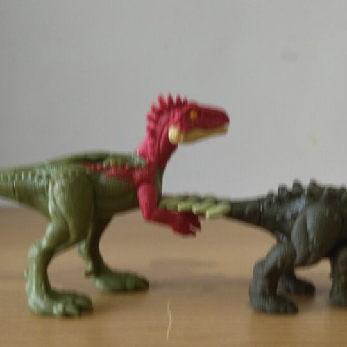 Jurassic World Eoraptor vs Stegouros action figures used set